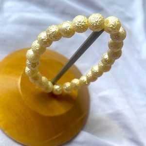 Ivory elegant beaded bracelet. Stretchy.